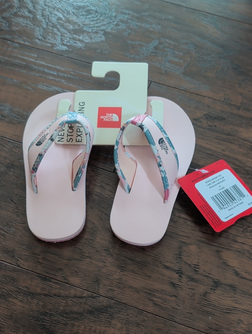 The North Face Girl’s Light Pink Flip Flop Sandals with Floral Straps